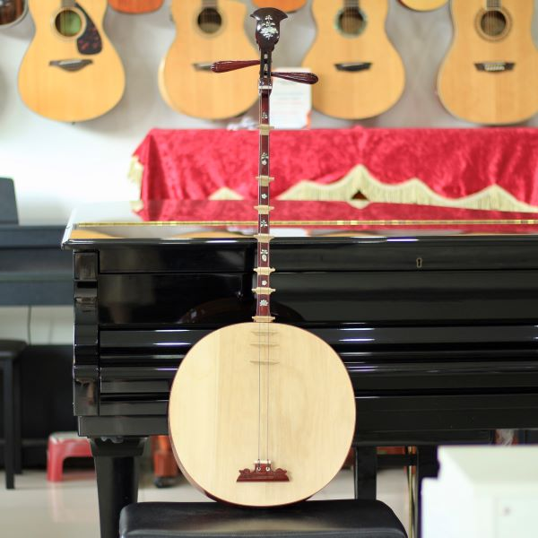 Dan Nguyet (Vietnamese Moon-Shaped Lute): The Story, Sound, Craftsmanship & Cultural Heritage of Vietnam.