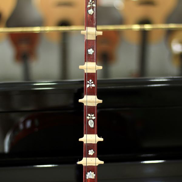 Dan Nguyet (Vietnamese Moon-Shaped Lute): The Story, Sound, Craftsmanship & Cultural Heritage of Vietnam.