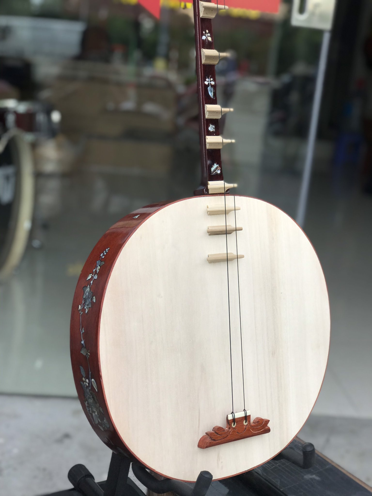 Dan Nguyet (Vietnamese Moon-Shaped Lute): The Story, Sound, Craftsmanship & Cultural Heritage of Vietnam.
