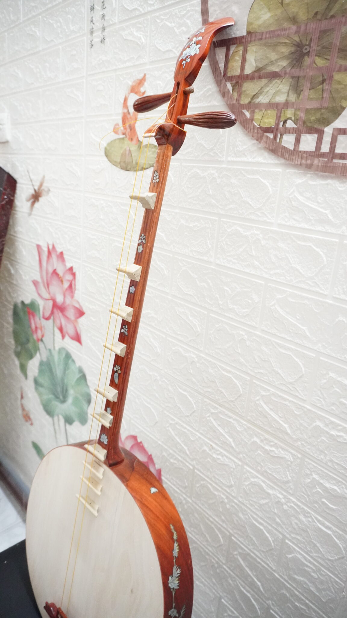 Dan Nguyet (Vietnamese Moon-Shaped Lute): The Story, Sound, Craftsmanship & Cultural Heritage of Vietnam.