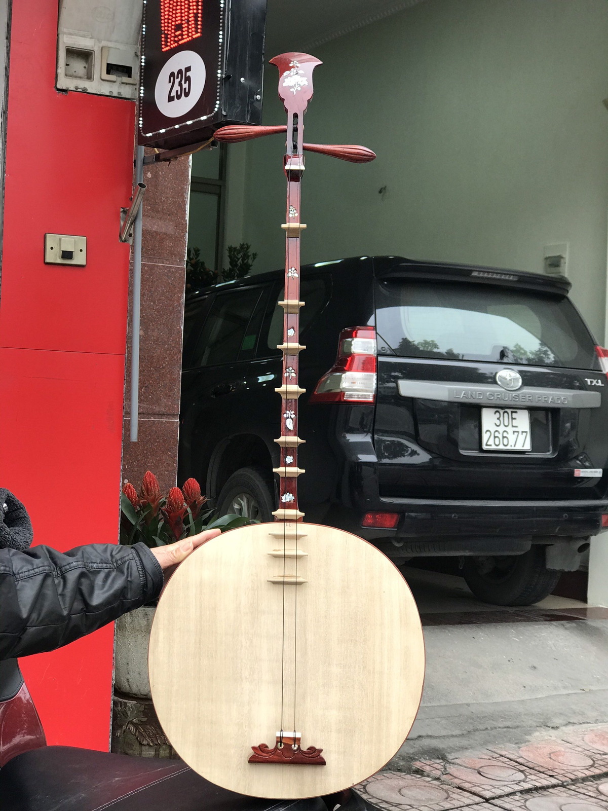 Dan Nguyet (Vietnamese Moon-Shaped Lute): The Story, Sound, Craftsmanship & Cultural Heritage of Vietnam.